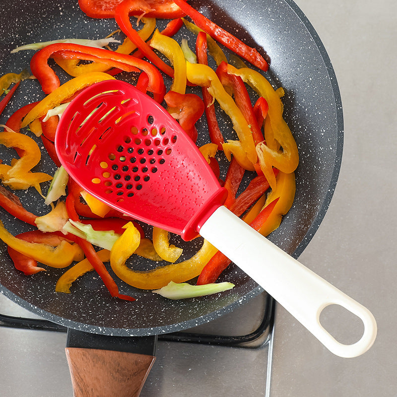 Multifunctional Slotted Cooking Spoon – Garlic Press, Masher & Stirring Spatula in One