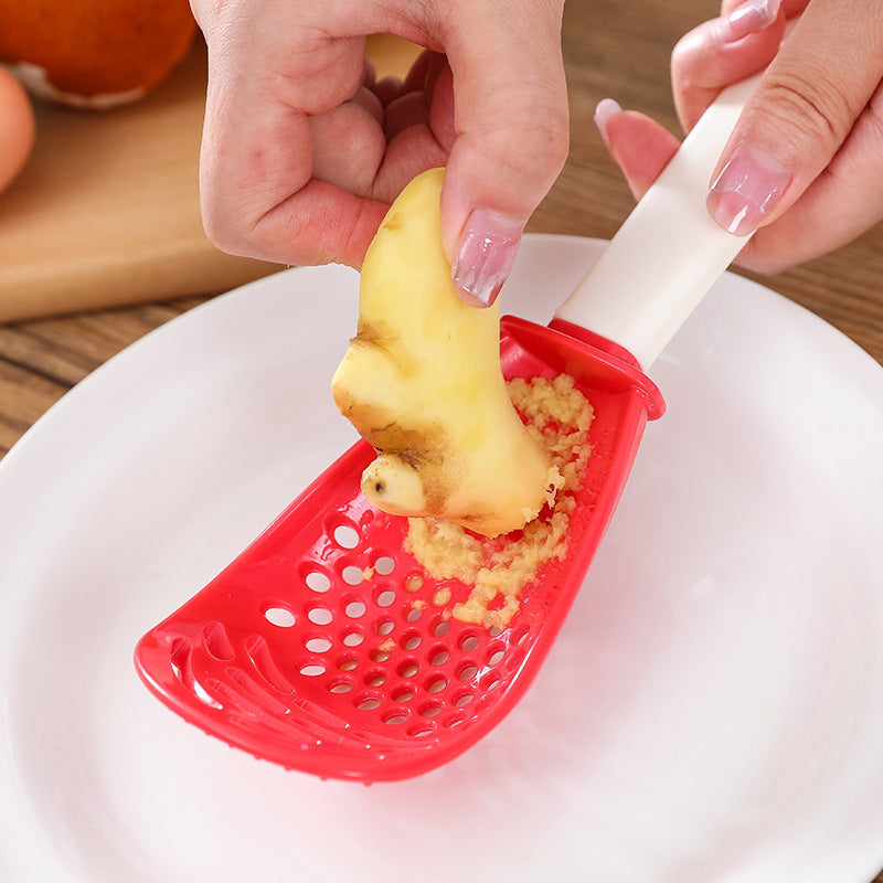 Multifunctional Slotted Cooking Spoon – Garlic Press, Masher & Stirring Spatula in One